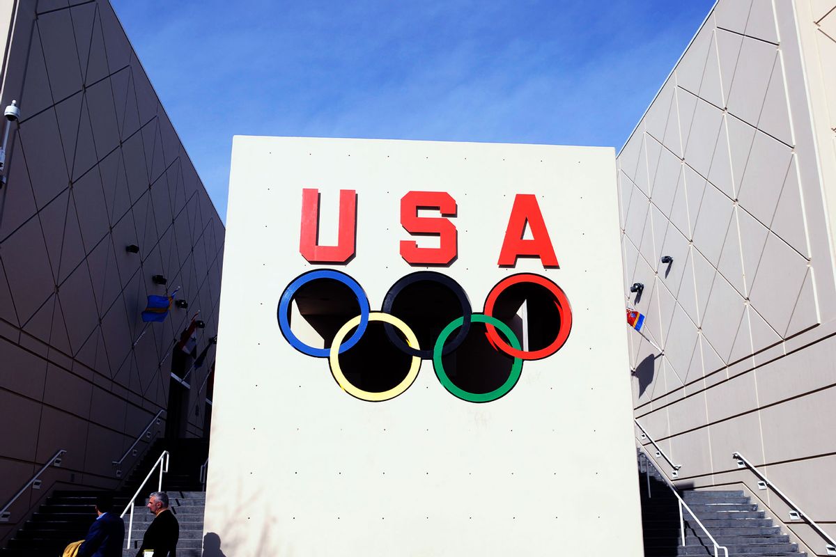 Visitors walk past the iconic Olympic rings at the United States Olympic Center in Colorado Springs during a tour of the facility. (Glenn Asakawa/The Denver Post via Getty Images)