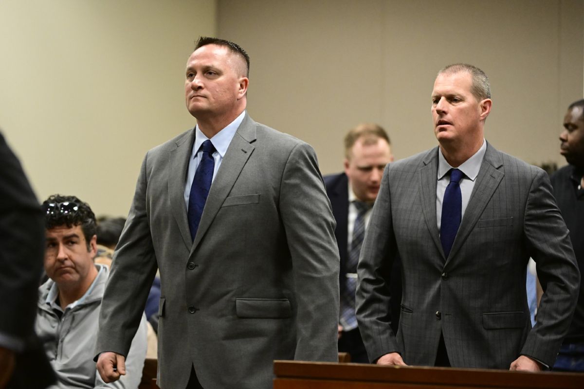 Paramedics Jeremy Cooper, left, and Peter Cichuniec, right, at an arraignment in the Adams County district court at the Adams County Justice Center January 20, 2023. (Andy Cross/MediaNews Group/The Denver Post via Getty Images)