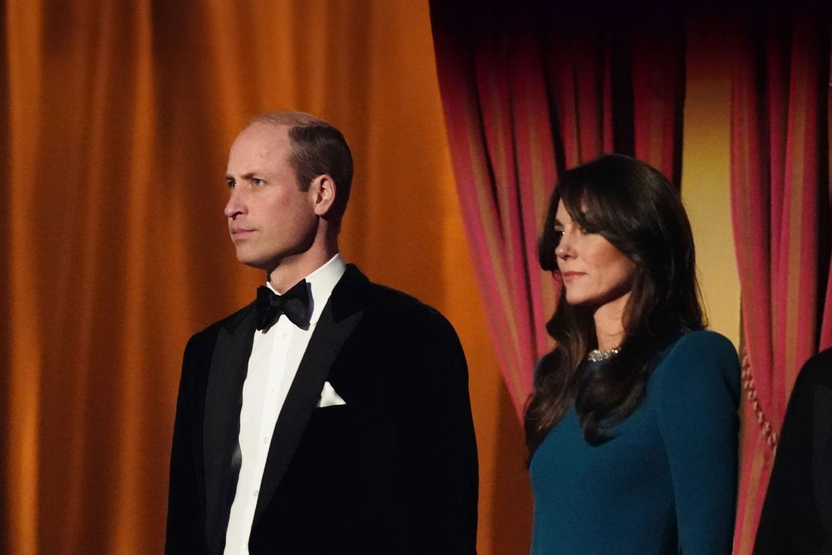 Prince William, Prince of Wales and Catherine, Princess of Wales stand for the national anthem during the Royal Variety Performance before the Royal Variety Performance at the Royal Albert Hall on November 30, 2023 in London, England. (Aaron Chown - WPA Pool/Getty Images)