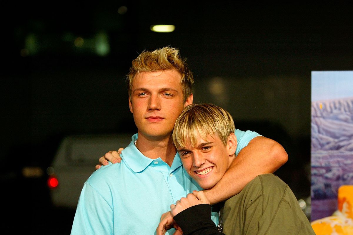 Aaron and Nick Carter (L) aririve for the "Simple Life 2" Welcome Home Party at The Spider Club on April 14, 2004 in Hollywood, California. (Frazer Harrison/Getty Images)