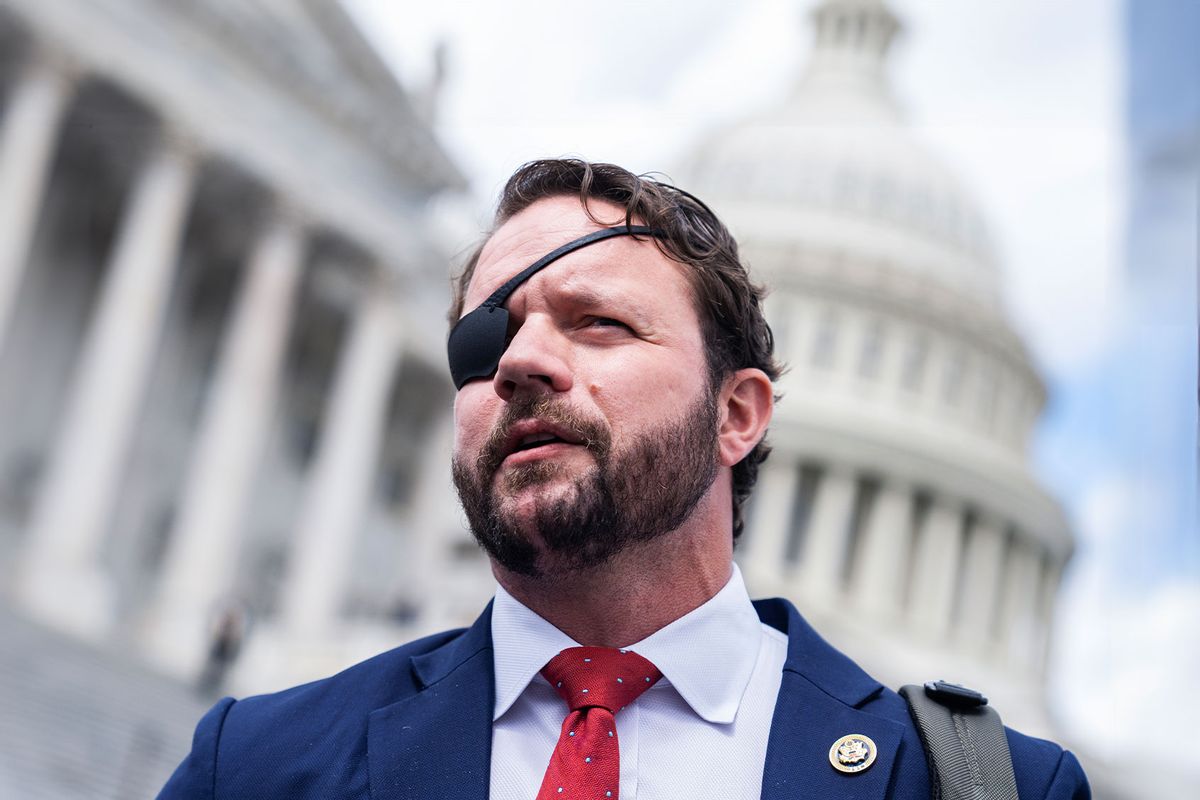 Rep. Dan Crenshaw, R-Texas, talks with reporters outside the U.S. Capitol after the House reauthorized Section 702 of the Foreign Intelligence Surveillance Act (FISA) on Friday, April 12, 2024. (Tom Williams/CQ-Roll Call, Inc via Getty Images)