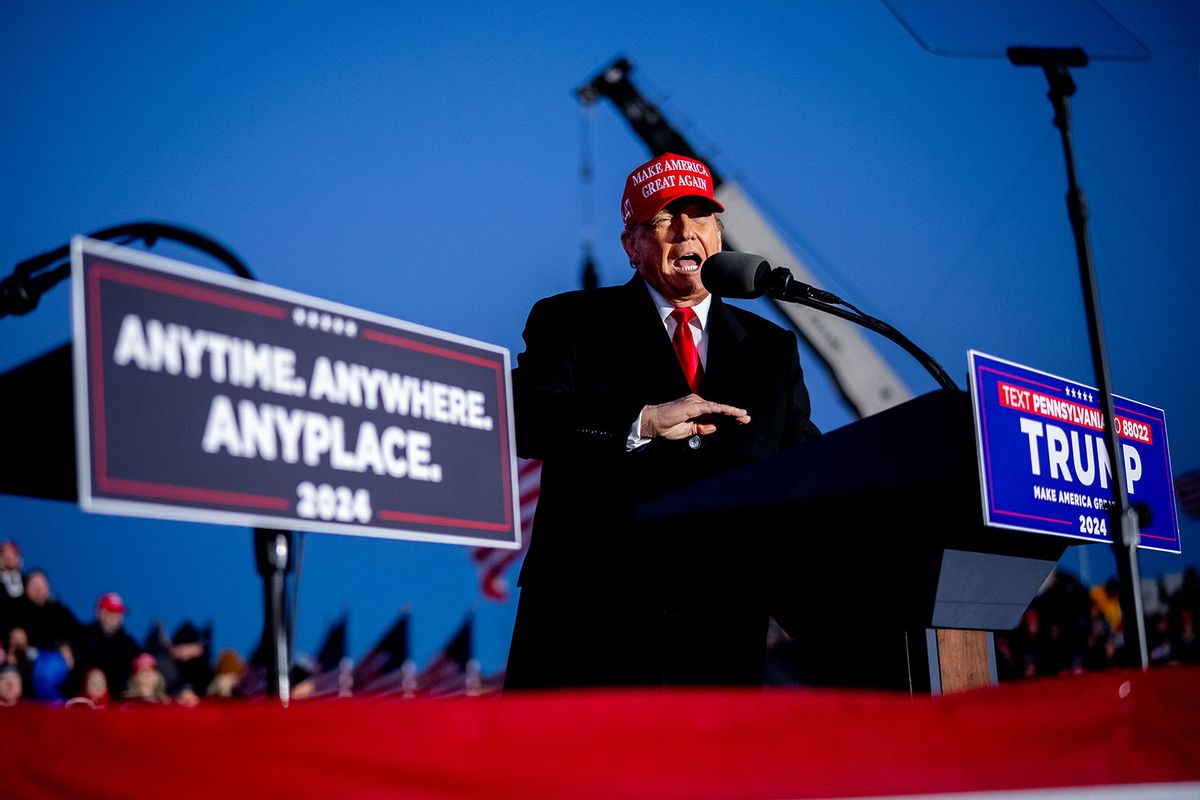 Republican presidential candidate, former President Donald Trump stands next to a podium placed next to him to challenge President Biden to a debate as he speaks at a rally outside Schnecksville Fire Hall on April 13, 2024 in Schnecksville, Pennsylvania. (Andrew Harnik/Getty Images)
