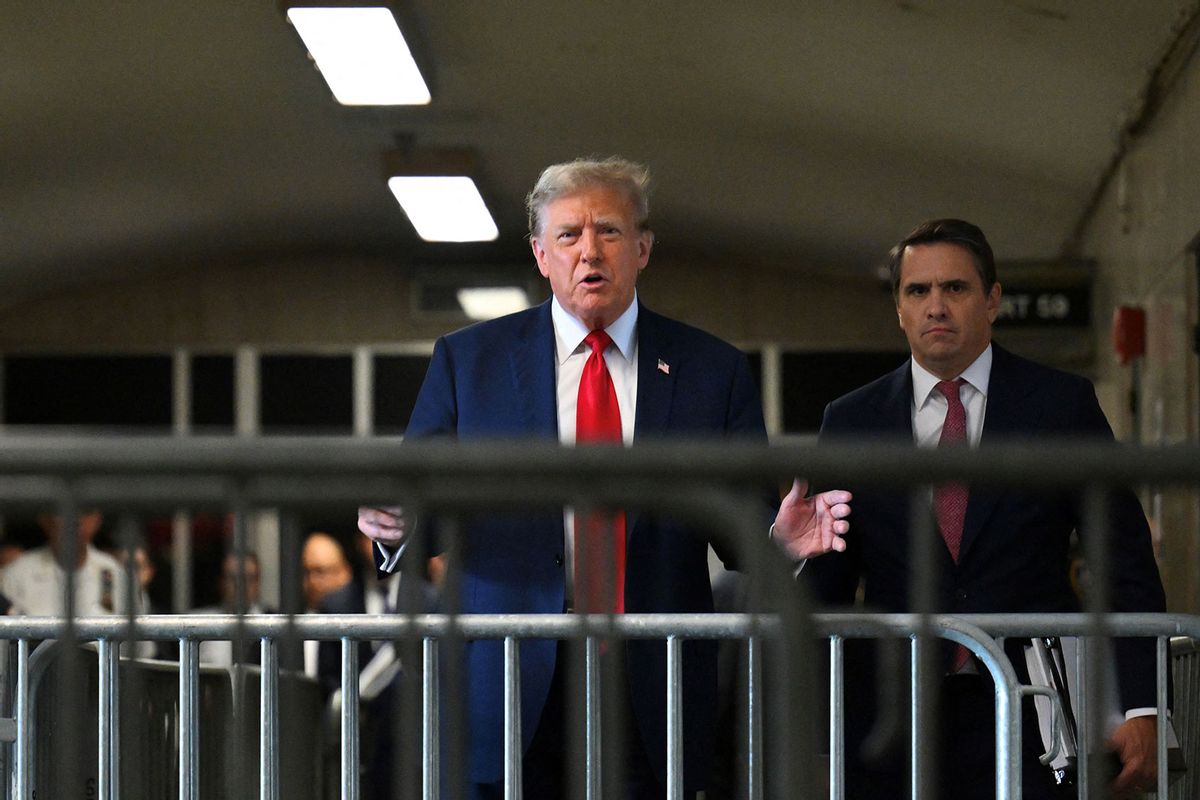 Former US President Donald Trump arrives for the first day of his trial for allegedly covering up hush money payments linked to extramarital affairs, at Manhattan Criminal Court in New York City on April 15, 2024. (ANGELA WEISS/POOL/AFP via Getty Images)