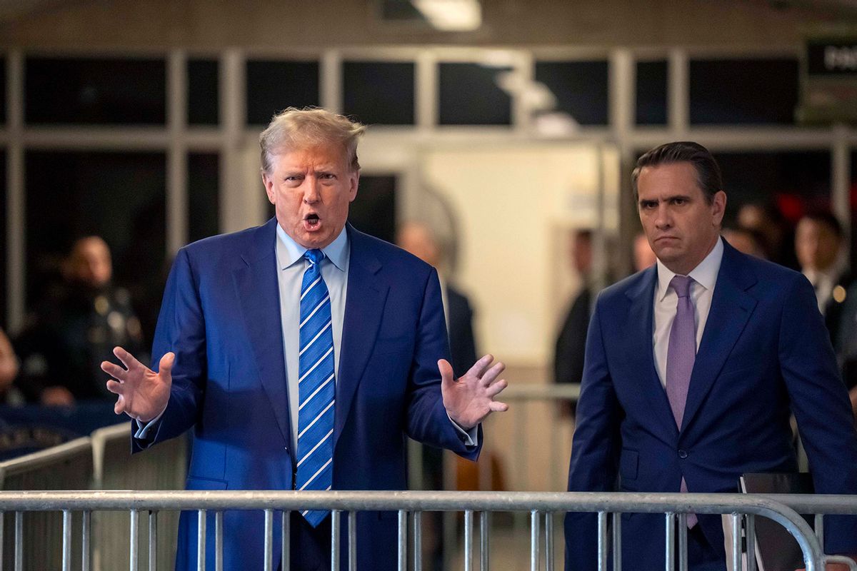 Former President Donald Trump speaks alongside his laywer Todd Blanche as he arrives for the second day of his criminal trial at Manhattan Criminal Court on April 16, 2024 in New York City. (Mark Peterson-Pool/Getty Images)