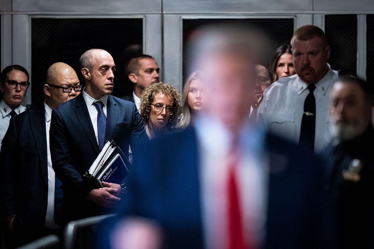 Lawyers Emil Bove (3L), and Susan Necheles (5L) arrive with Former U.S. President Donald Trump ahead of the start of jury selection at Manhattan Criminal Court on April 15, 2024 in New York City. (Jabin Botsford-Pool/Getty Images)