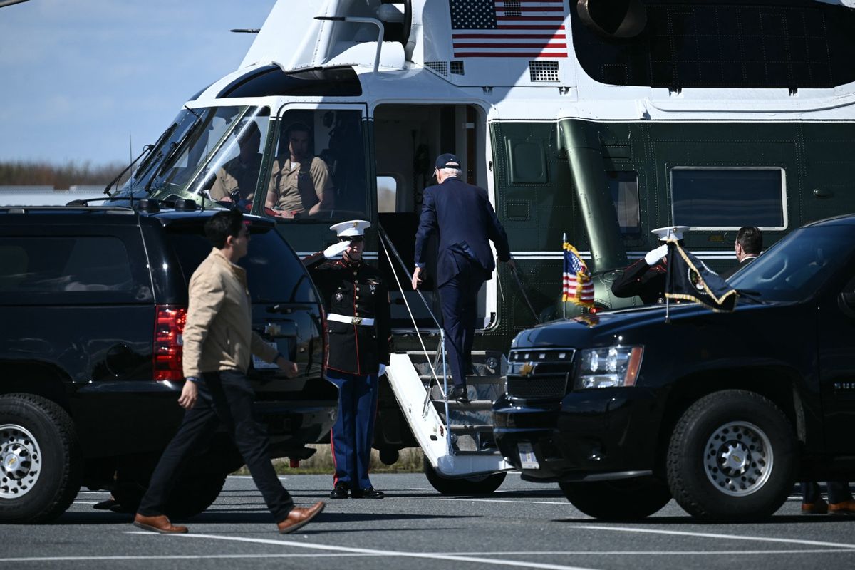 President Joe Biden boards Marine One at Gordons Pond in Rehoboth Beach, Delaware, as he returns to the White House on April 13, 2024. (BRENDAN SMIALOWSKI/AFP via Getty Images)