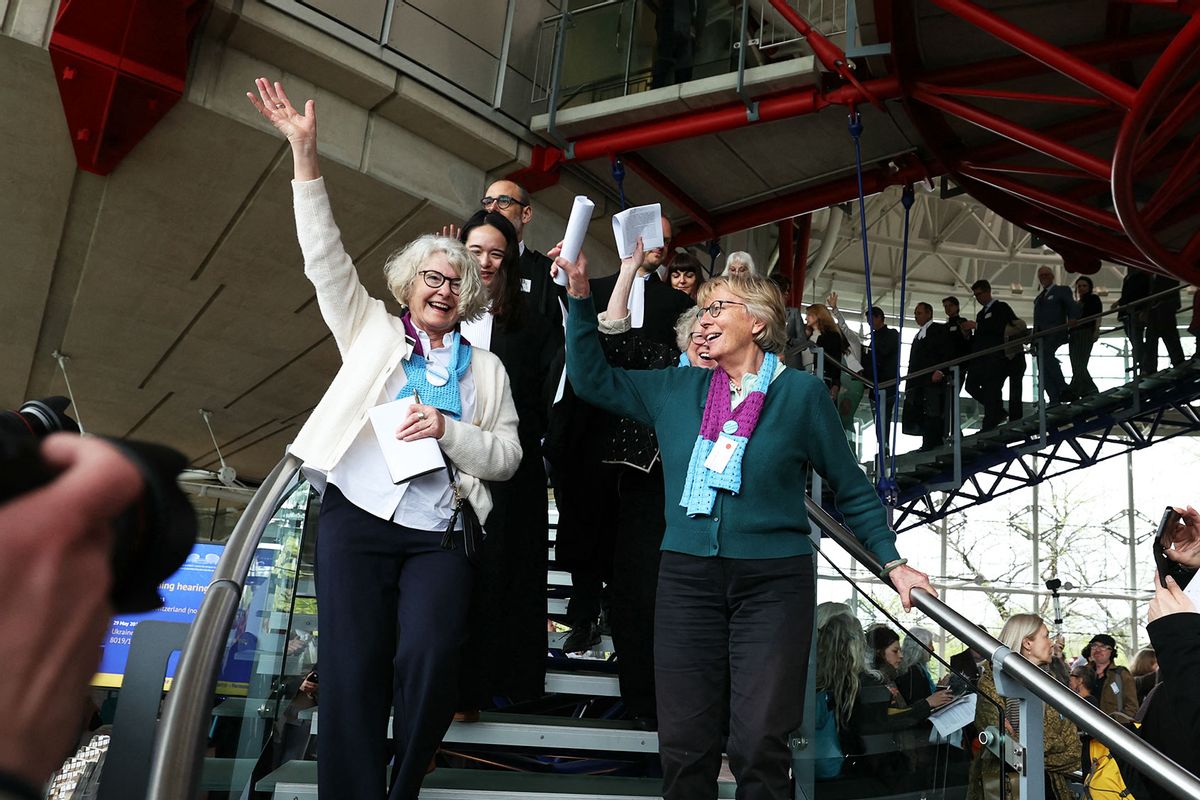 Members of Swiss association Senior Women for Climate Protection react after the announcement of decisions after a hearing of the European Court of Human Rights (ECHR) to decide in three separate cases if states are doing enough in the face of global warming in rulings that could force them to do more, in Strasbourg, eastern France, on April 9, 2024. (FREDERICK FLORIN/AFP via Getty Images)