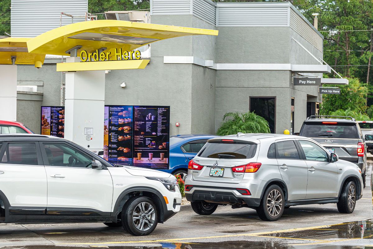 McDonald's Restaurant drive thru order area, with line of cars. (Jeffrey Greenberg/Universal Images Group via Getty Images)