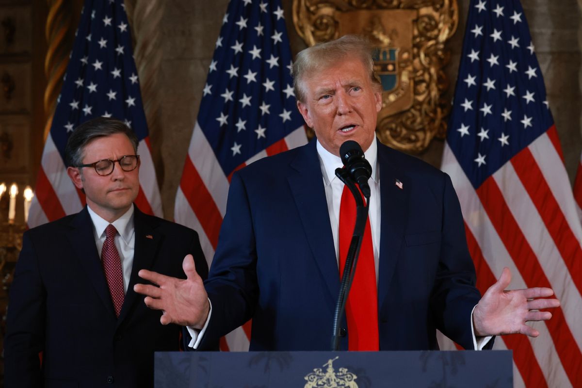 Republican presidential candidate former President Donald Trump and Speaker of the House Mike Johnson (R-LA) hold a press conference at Mr. Trump's Mar-a-Lago estate on April 12, 2024, in Palm Beach, Florida. (Joe Raedle/Getty Images)