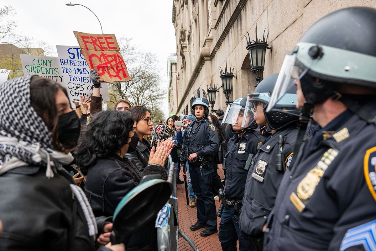 Students and pro-Palestinian activists face police as they gather outside of Columbia University to protest the university's stance on Israel on April 18, 2024 in New York City. (Spencer Platt/Getty Images)