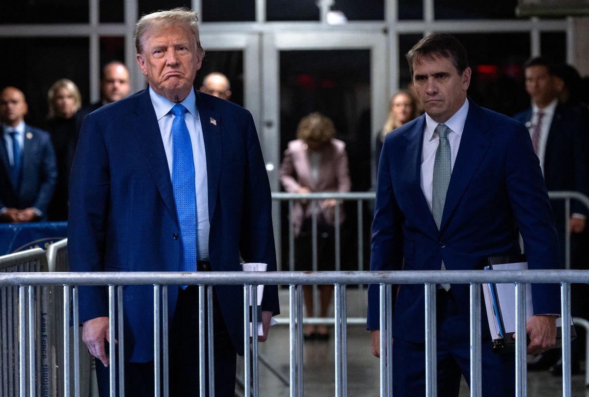 Former President Donald Trump, with attorney Todd Blanche (R), speaks to the press as he arrives at his trial for allegedly covering up hush money payments linked to extramarital affairs, at Manhattan Criminal Court in New York City on April 26, 2024. (MICHAEL M. SANTIAGO/POOL/AFP via Getty Images)