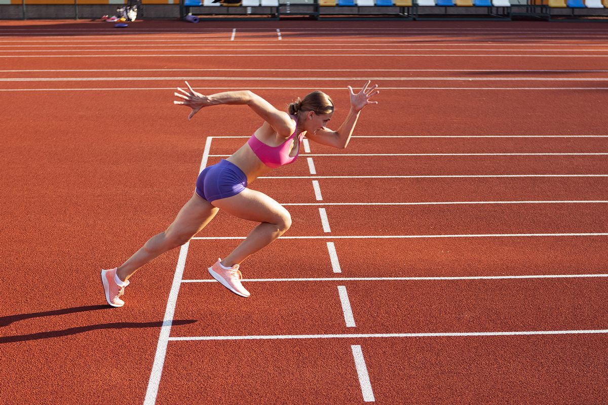 A woman running on a track (iStock / Getty Images)