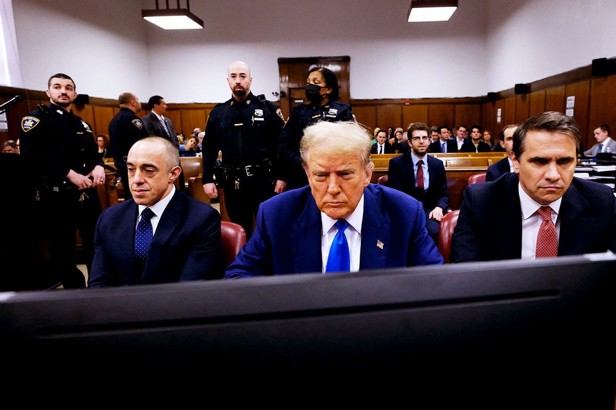 Former US President Donald Trump, sitting with attorneys Emil Bove (L) and Todd Blanche (R), attends his trial for allegedly covering up hush money payments linked to extramarital affairs, at Manhattan Criminal Court in New York City, on May 3, 2024. (CURTIS MEANS/POOL/AFP via Getty Images)