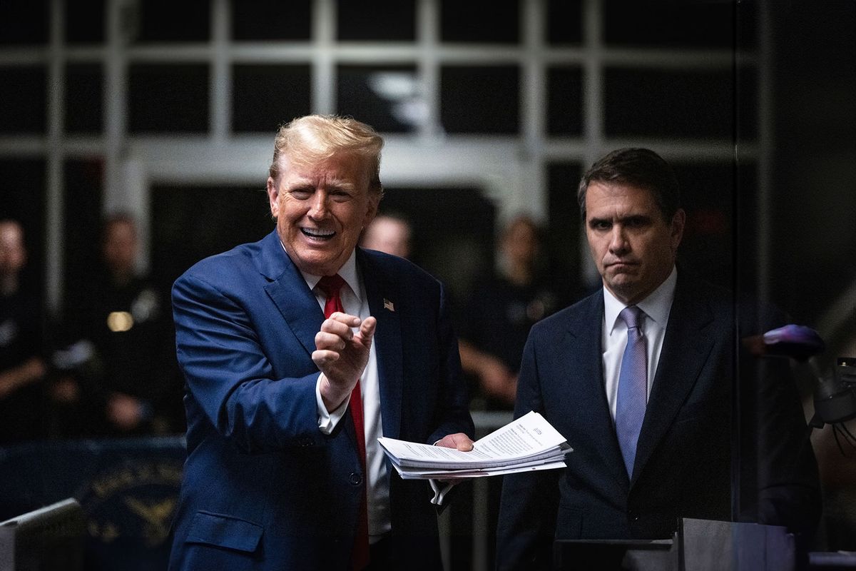 Former US President Donald Trump, with attorney Todd Blanche (R), speaks to the press before leaving for the day at his trial for allegedly covering up hush money payments linked to extramarital affairs, at Manhattan Criminal Court in New York City, on May 10, 2024. (VICTOR J. BLUE/POOL/AFP via Getty Images)