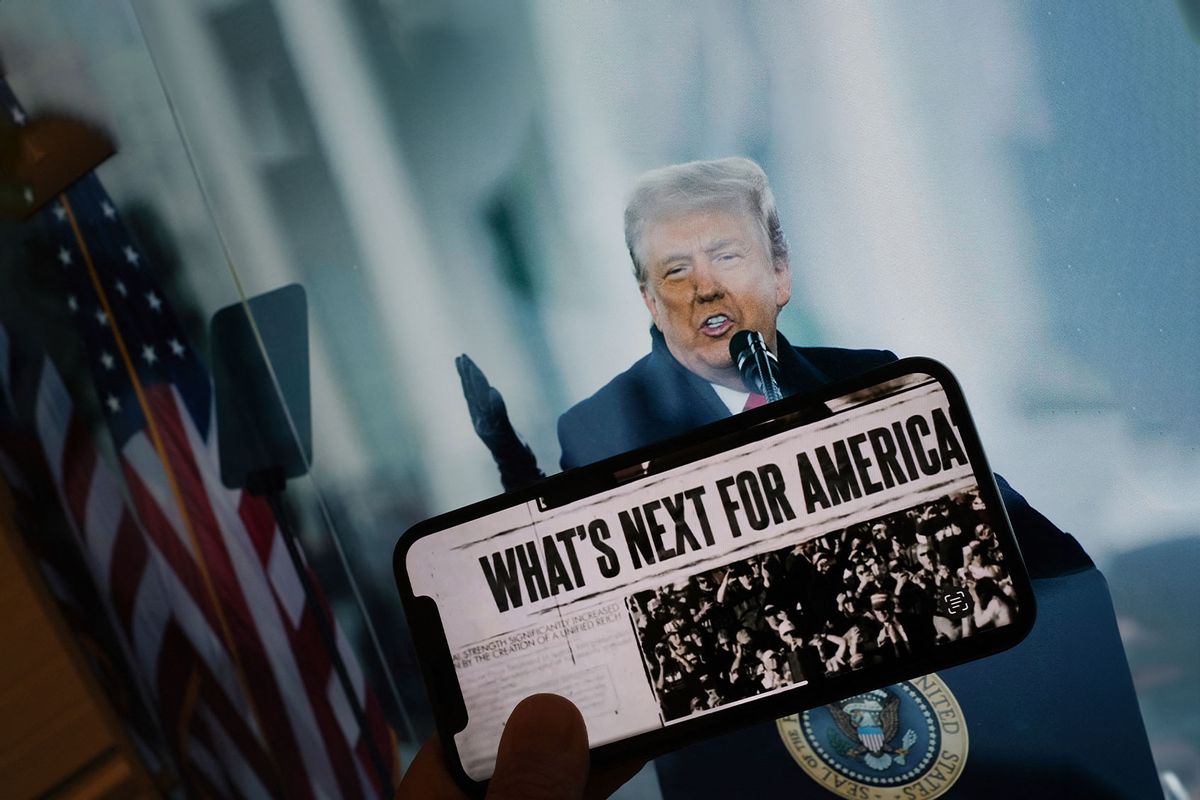 This illustration photo created May 20, 2024 in Los Angeles shows a frame from a video posted on Donald Trump's Truth Social account displayed on a smartphone in front of a photo of the former US president. (CHRIS DELMAS/AFP via Getty Images)