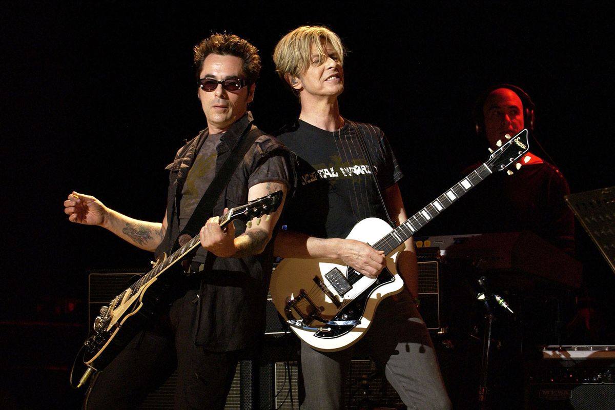 Earl Slick and David Bowie during David Bowie Gives Fans a Strong Dose of "A Reality Tour" at Special Poughkeepsie Warm Up Show For His Upcoming World Tour at The Chance Nightclub in Poughkeepsie, New York, United States. (KMazur/WireImage/Getty Images)