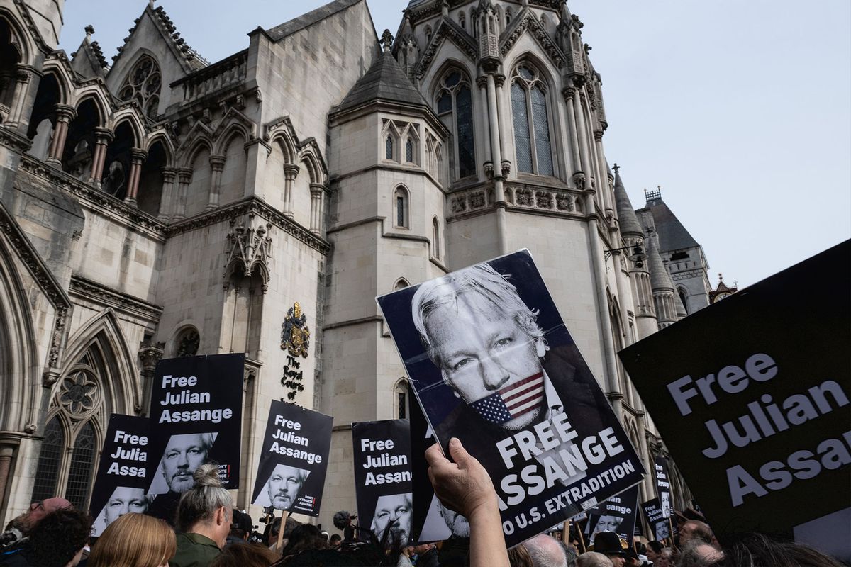Supporters of Julian Assange gather at the Royal Courts of Justice on March 26, 2024 in London, England. (Guy Smallman/Getty Images)