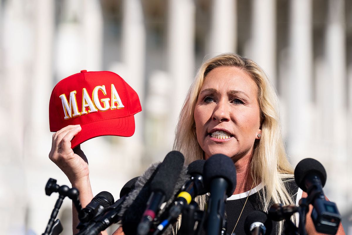 Rep. Marjorie Taylor Greene, R-Ga., holds her "Make America Great Again" hat during a news conference outside the U.S. Capitol on Wednesday, May 1, 2024. (Bill Clark/CQ-Roll Call, Inc via Getty Images)