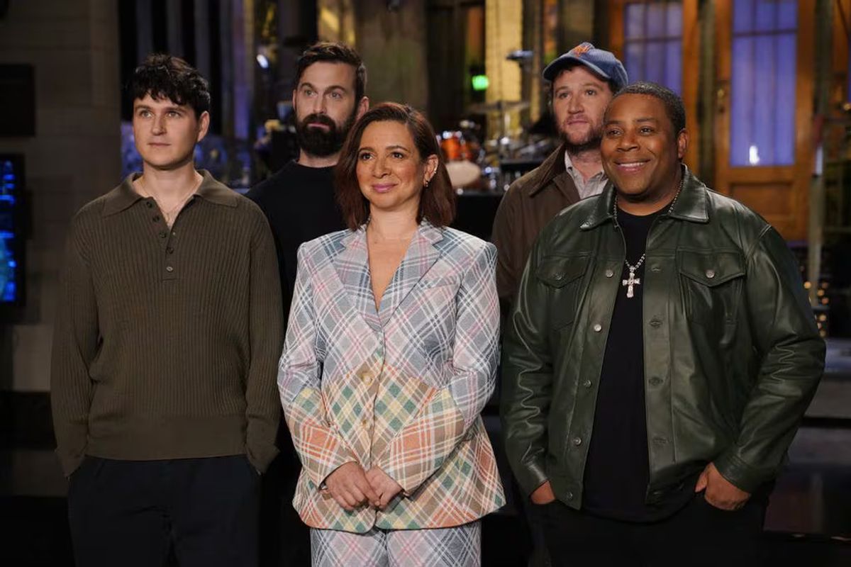 From left: Musical guest Vampire Weekend, host Maya Rudolph, and Kenan Thompson during Promos in Studio 8H on Thursday. (ROSALIND O'CONNOR/NBC)