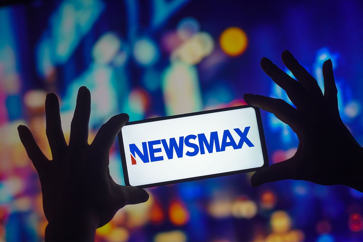 The Newsmax logo seen displayed on a smartphone. (Rafael Henrique/SOPA Images/LightRocket via Getty Images)