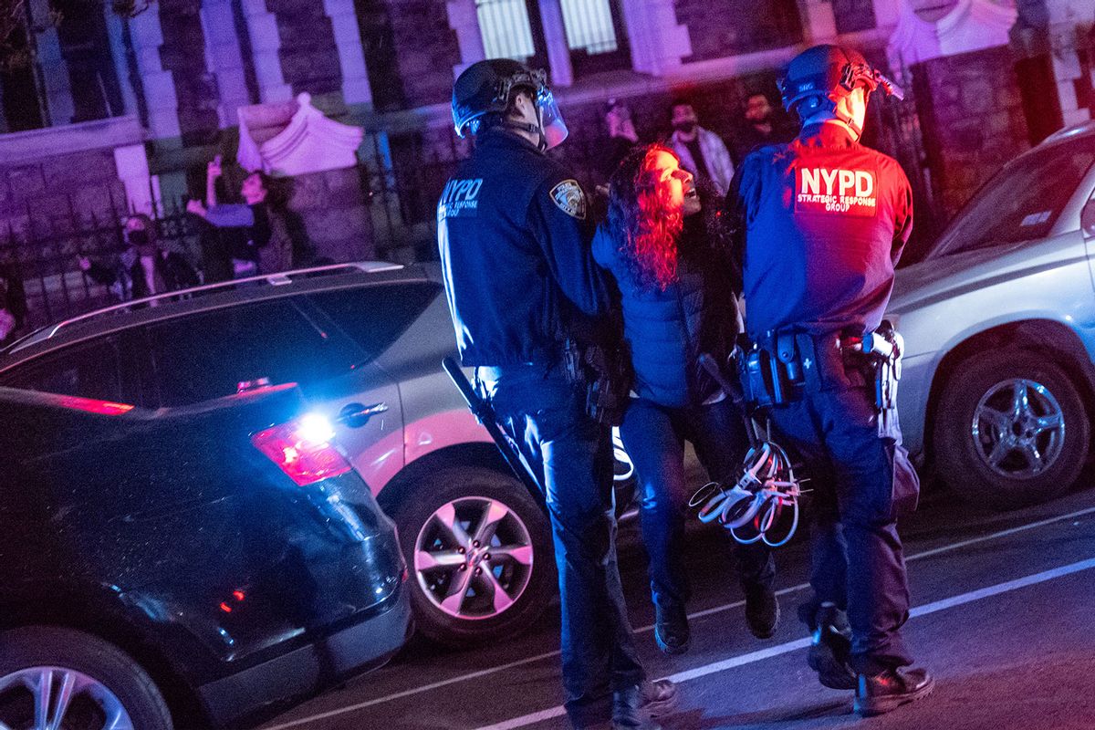 Police arrest protesters during pro-Palestinian demonstrations at The City College Of New York (CUNY) as the NYPD cracks down on protest camps at both Columbia University and CCNY on April 30, 2024 in New York City. (Spencer Platt/Getty Images)