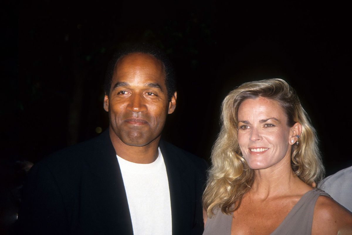 O.J. Simpson and Nicole Brown Simpson pose at the premiere of the "Naked Gun 33 1/3: The Final Isult" in which O.J. starred on March 16, 1994 in Los Angeles, California. (Vinnie Zuffante/Getty Images)