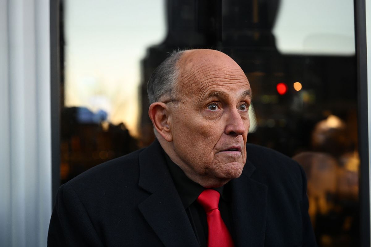 Rudy Giuliani speaks to the media as he arrives at the Farm Bar and Grill where a Florida Governor Ron DeSantis event was originally going to be held on Sunday January 21, 2024 in Manchester, NH. (Matt McClain/The Washington Post via Getty Images)