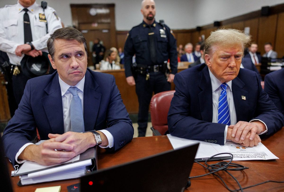 Former President Donald Trump sits at the defendant's table with his lawyer Todd Blanche before his criminal trial at Manhattan Criminal Court, in New York City, on May 13, 2024. (SARAH YENESEL/POOL/AFP via Getty Images)