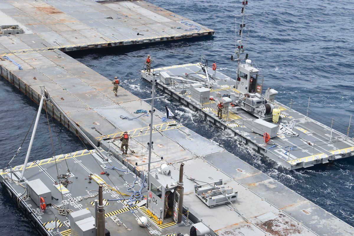 An aerial view of a construction area as US soldiers assemble the Roll-On, Roll-Off Distribution Facility (RRDF), or floating pier, to ensure the entry of humanitarian aid to Gaza, off the shore of Gaza in the Mediterranean Sea on April 29, 2024. (U.S. Central Command (CENTCOM)/Anadolu via Getty Images)