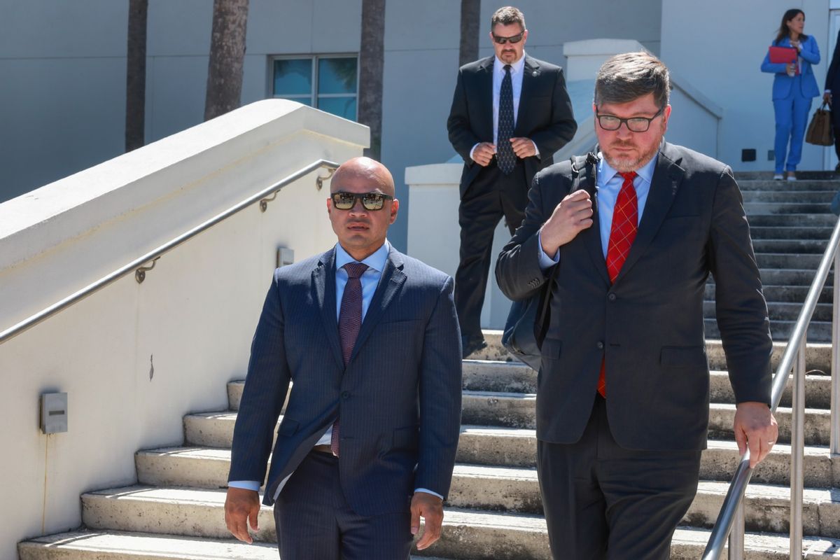 Walt Nauta (L), an aide to former U.S. President Donald Trump, walks with his lawyer Stanley Woodward (R) as they leave the Alto Lee Adams Sr United States Courthouse on May 22, 2024 in Fort Pierce, Florida.  ( Joe Raedle/Getty Images)