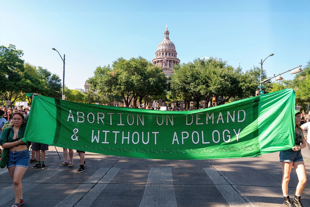 Abortion rights demonstrators march near the State Capitol in Austin, Texas, June 25, 2022. (SUZANNE CORDEIRO/AFP via Getty Images)