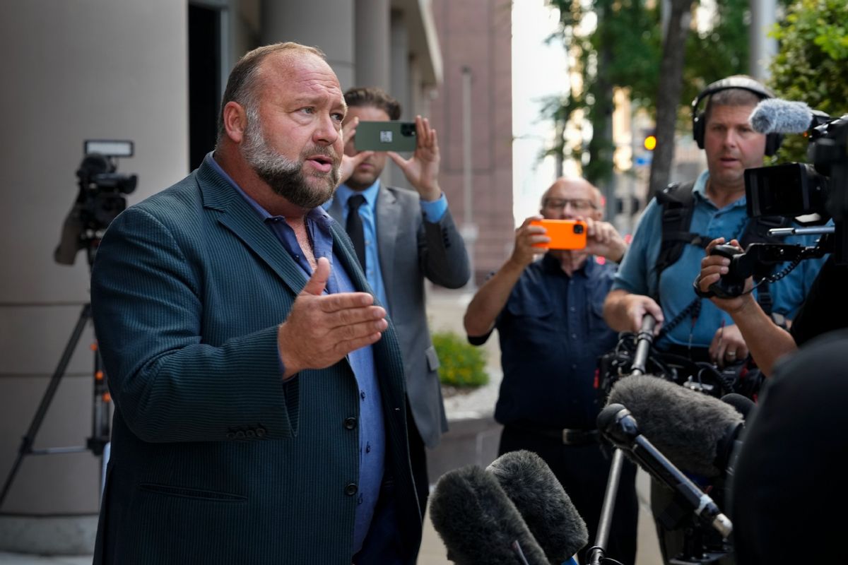 Right-wing conspiracy theorist Alex Jones speaks to the press before his bankruptcy hearing on Friday, June 14, 2024, at Bob Casey Federal Courthouse in Houston.  (Yi-Chin Lee/Houston Chronicle via Getty Images)