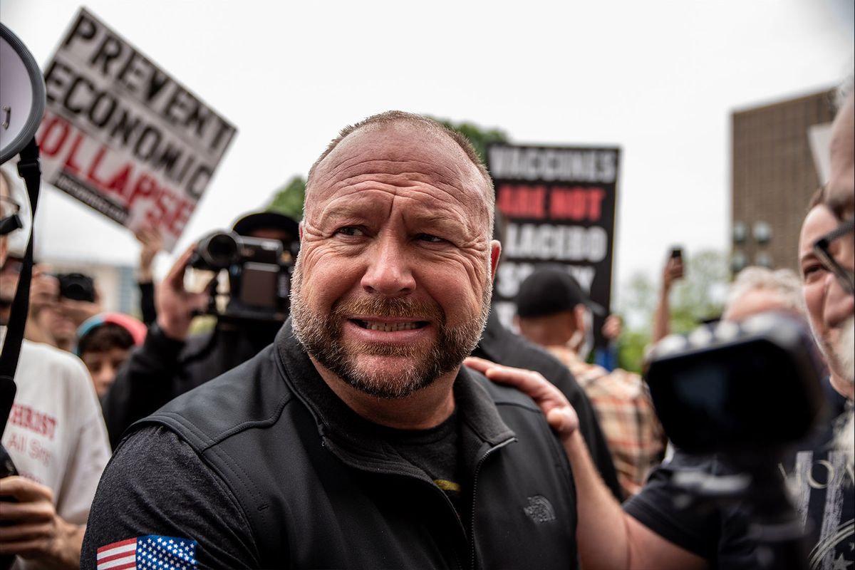 Infowars founder Alex Jones interacts with supporters at the Texas State Capital building on April 18, 2020 in Austin, Texas. (Sergio Flores/Getty Images)