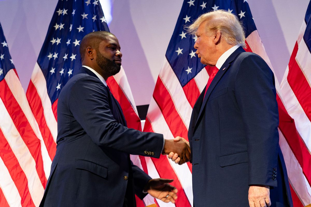 U.S. Congressman Byron Donalds shakes hands with of Former U.S. President and Republican presidential candidate Donald Trump at the Moms for Liberty Summit in Philadelphia, Pennsylvania, 2023. (Hannah Beier for the Washington Post)