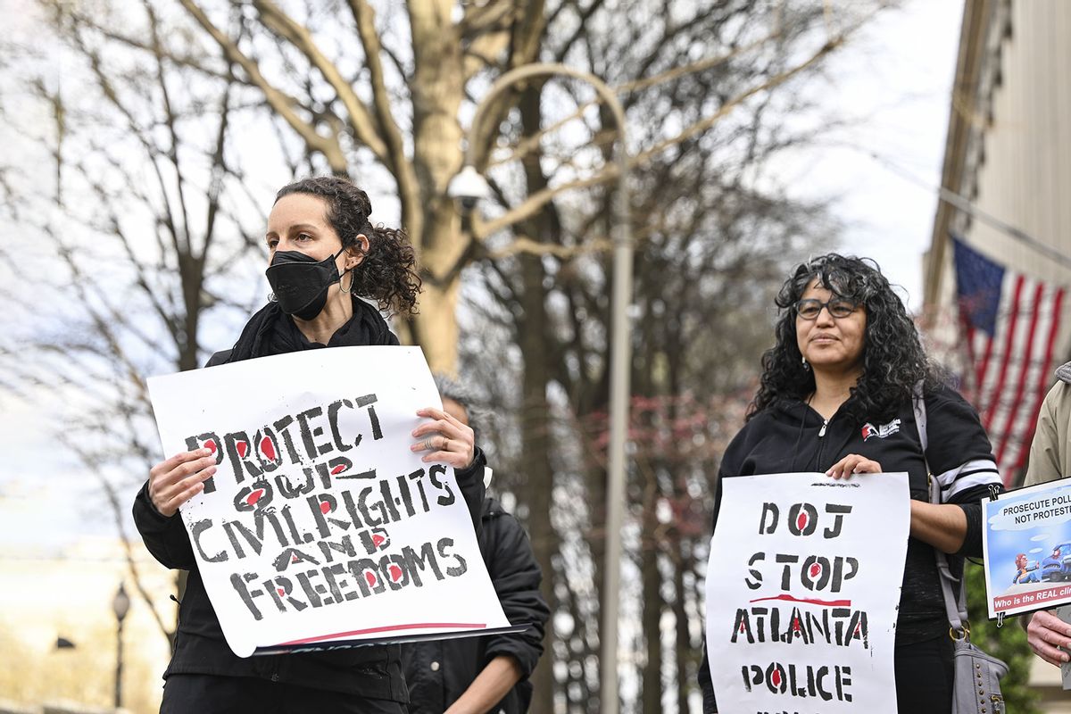 The demonstrators are protesting from a broad range of ideologies and coalitions called for solidarity with the "Stop Cop City" movement in Atlanta on March 28, 2023, in front of the Department of Justice in Washington DC, United States. (Celal Gunes/Anadolu Agency via Getty Images)