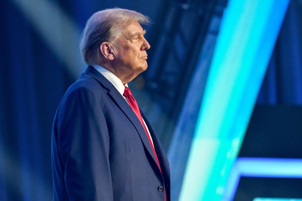 Former President Donald Trump takes the stage to speak at The People's Convention hosted by Turning Point Action at The Huntington Place in Detroit, MI on June 15, 2024.  (Adam J. Dewey/Anadolu via Getty Images)