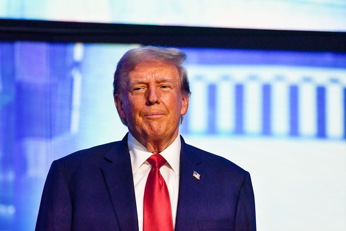 Former President Donald Trump takes the stage to speak at The People's Convention hosted by Turning Point Action at The Huntington Place in Detroit, MI on June 15, 2024. (Adam J. Dewey/Anadolu via Getty Images)