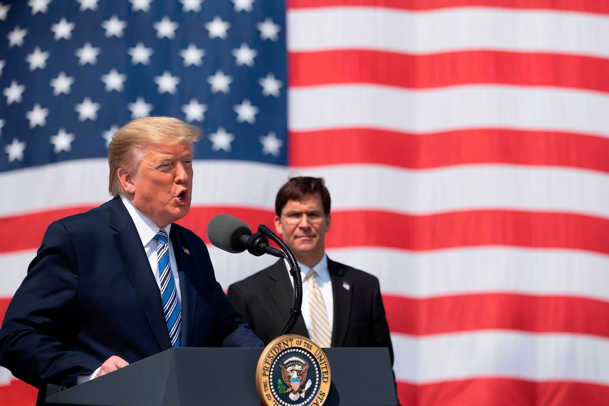 US President Donald Trump, with Defense Secretary Mark Esper, speaks during the departure ceremony for the hospital ship USNS Comfort at Naval Base Norfolk on March 28, 2020, in Norfolk, Virginia. (JIM WATSON/AFP via Getty Images)