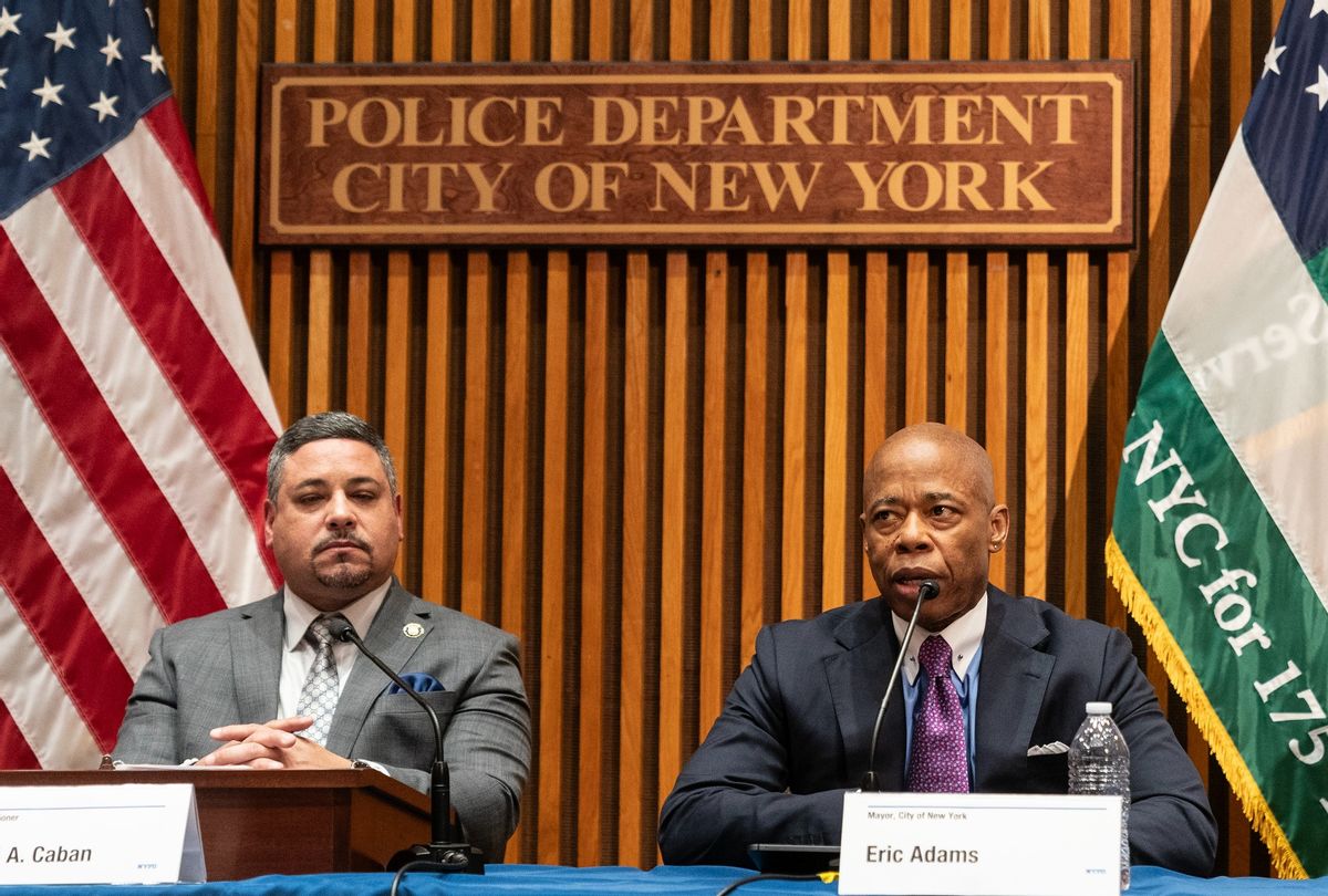 Mayor Eric Adams speaks as Police Commissioner Edward Caban listens during announcement end-of-year citywide crime statistics at One Police Plaza.  ( Lev Radin/Pacific Press/LightRocket via Getty Images)
