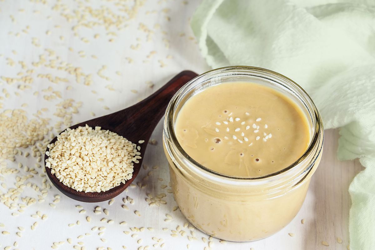 Jar of Tahini Sauce with Sesame Seeds (Getty Images/Stephanie Frey)