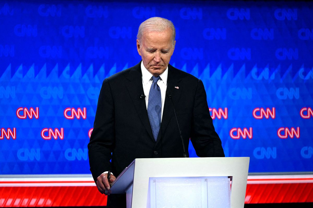 US President Joe Biden looks down as he participates in the first presidential debate of the 2024 elections with former US President and Republican presidential candidate Donald Trump at CNN's studios in Atlanta, Georgia, on June 27, 2024. (ANDREW CABALLERO-REYNOLDS/AFP via Getty Images)
