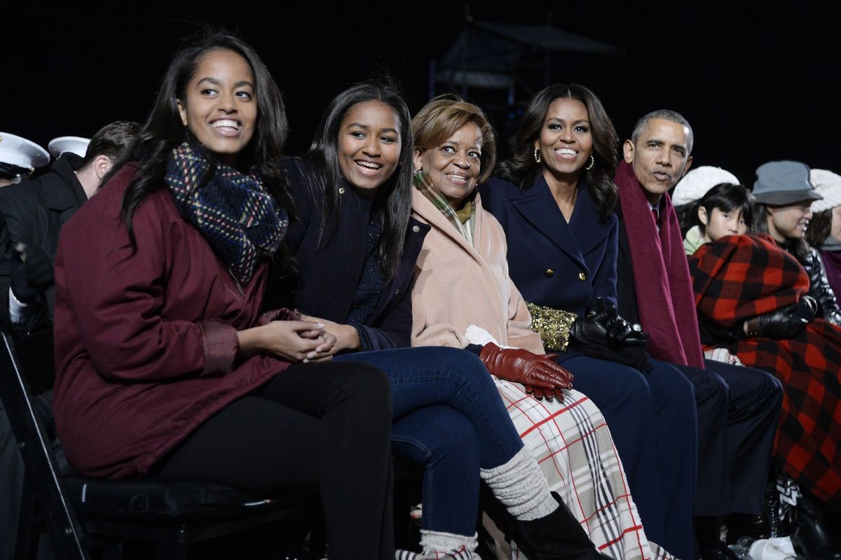 Malia Obama, Sasha Obama, mother-in-law Marian Robinson, first lady Michelle Obama and President Barack Obama attend the national Christmas tree lighting ceremony on the Ellipse south of the White House December 3, 2015 in Washington, DC. (Olivier Douliery- Pool/Getty Images)