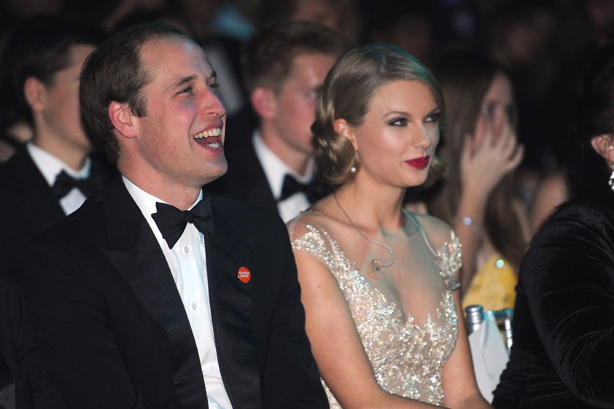 Prince William, Duke of Cambridge and Taylor Swift attend the Winter Whites Gala In Aid Of Centrepoint on November 26, 2013, in London, England.  (Dave J Hogan/Centrepoint/Getty Images)