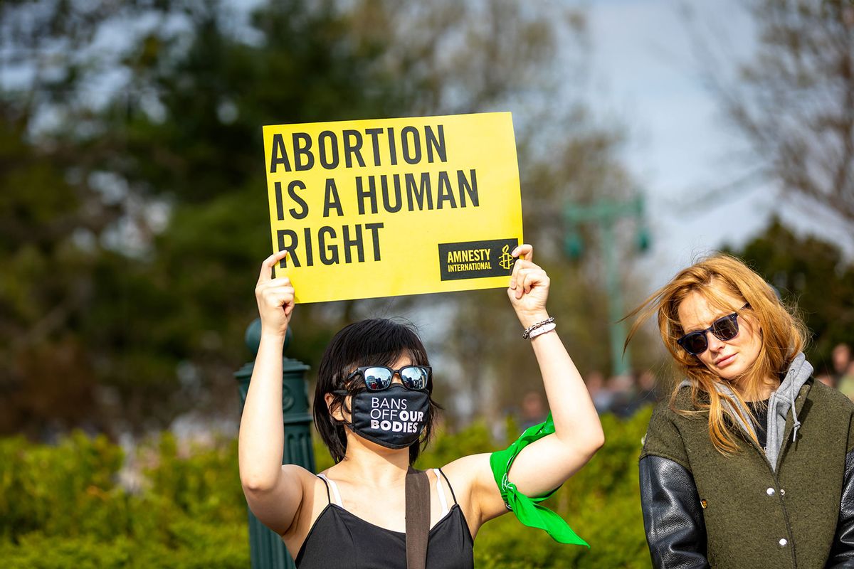 Demonstrators protest and argue outside the U.S. Supreme Court on March 26, 2024. (Michael Nigro/Pacific Press/LightRocket via Getty Images)