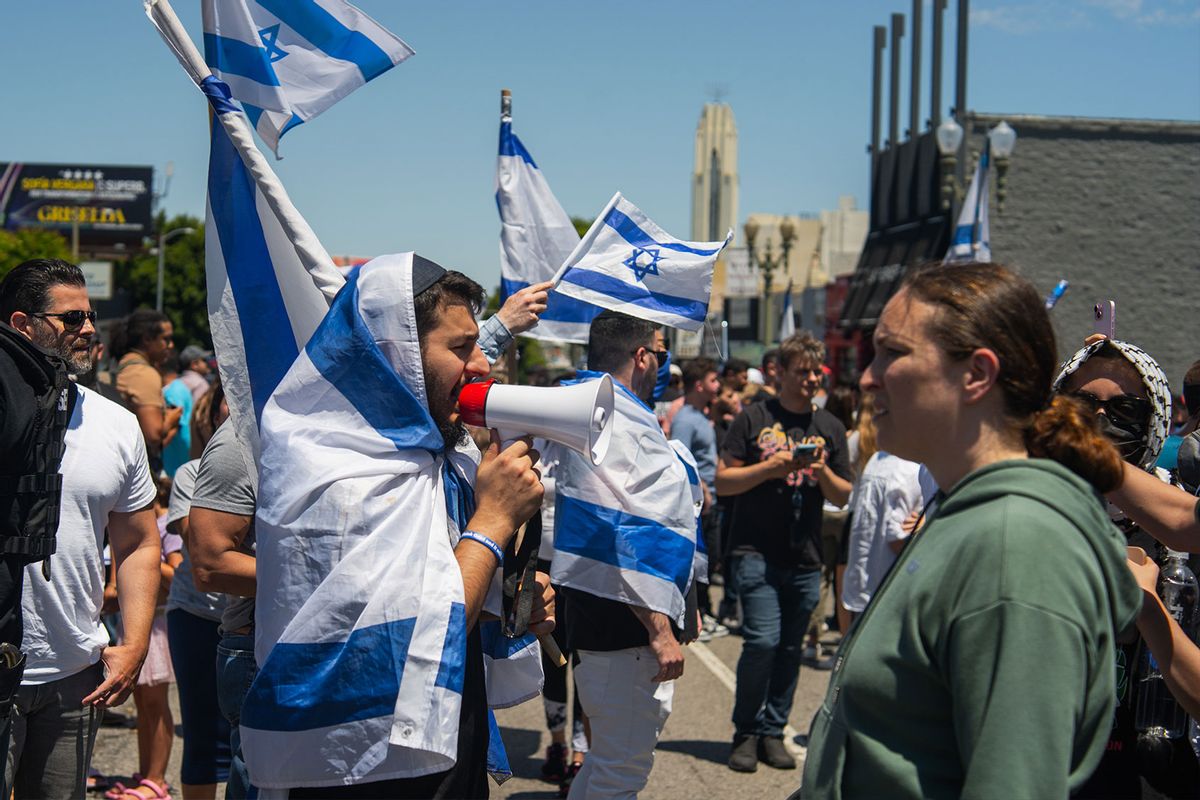 Pro-Israel protesters and Pro-Palestine protesters face off outside of the Adas Torah Orthodox Jewish synagogue in Los Angeles, June 23, 2024.  (Shay Horse/NurPhoto via Getty Images)