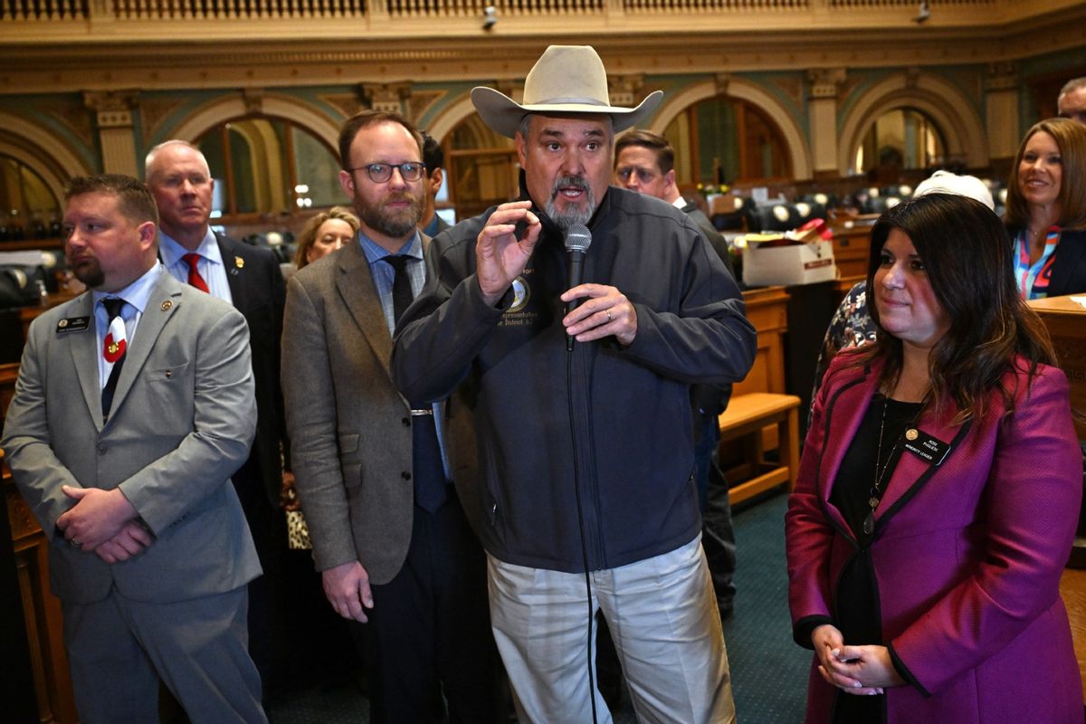 Colorado representative Richard Holtorf, center, makes remarks during a press conference on the House floor a day after the ending of the 2024 Legislative session at the Colorado State Capitol in Denver, Colorado on May 9, 2024. (Helen H. Richardson/MediaNews Group/The Denver Post via Getty Images)