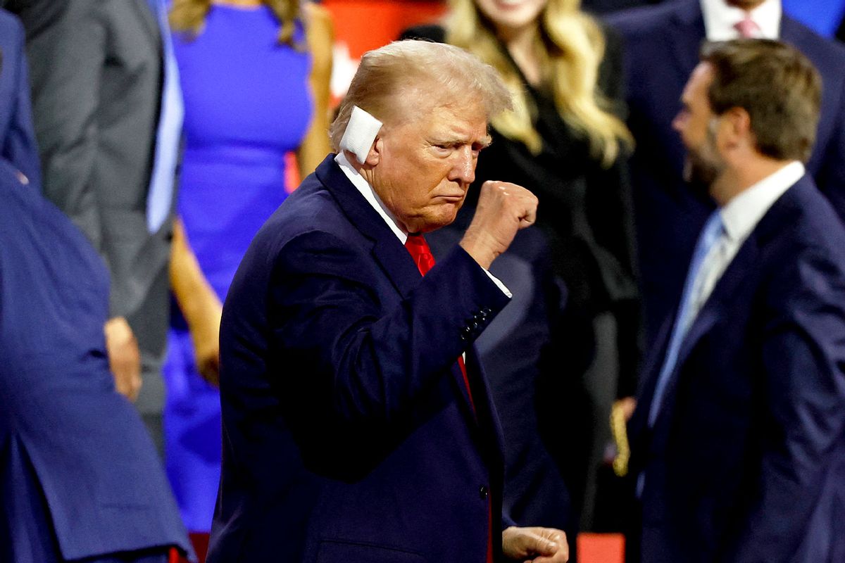 US former President and 2024 Republican presidential candidate Donald Trump pumps his fist during the first day of the 2024 Republican National Convention at the Fiserv Forum in Milwaukee, Wisconsin, July 15, 2024. (KAMIL KRZACZYNSKI/AFP via Getty Images)