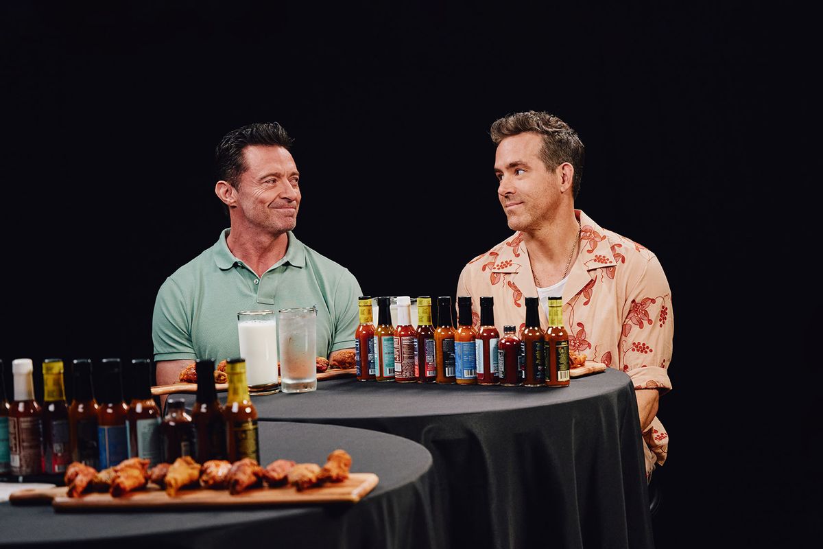 Hugh Jackman and Ryan Reynolds on “Hot Ones.” (Photo courtesy of First We Feast)