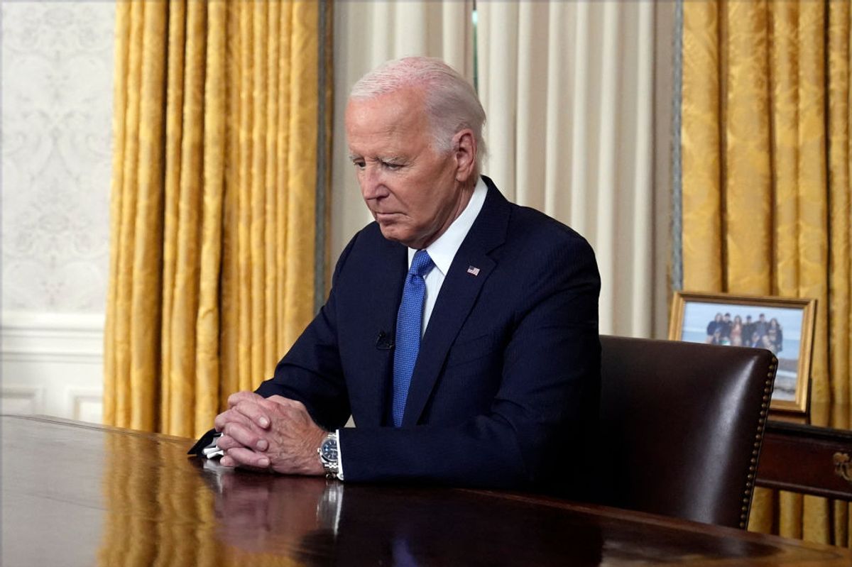 President Joe Biden pauses before addressing the nation about his decision to not seek re-election, in the Oval Office at the White House in Washington, July 24, 2024.  (Evan Vucci/POOL/AFP via Getty Images)