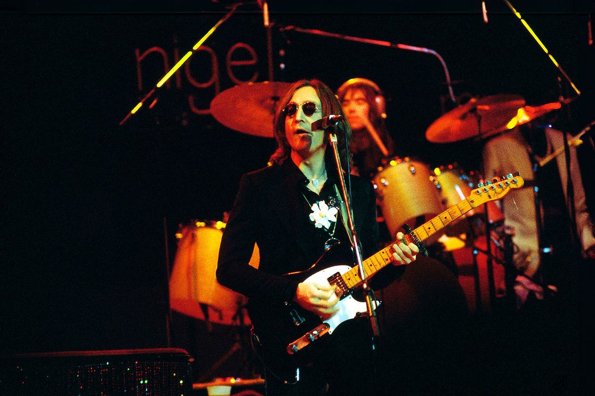 John Lennon performing live onstage on November 28, 1974. (Steve Morley/Redferns/Getty Images)